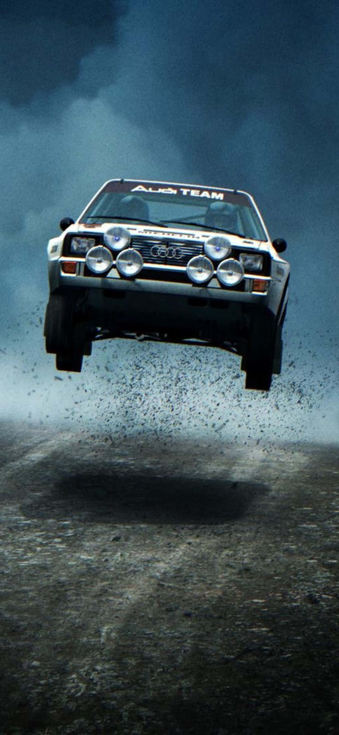 iPhone Xs Dirt Rally로 짜릿한 흥분을 느껴보세요 배경화면