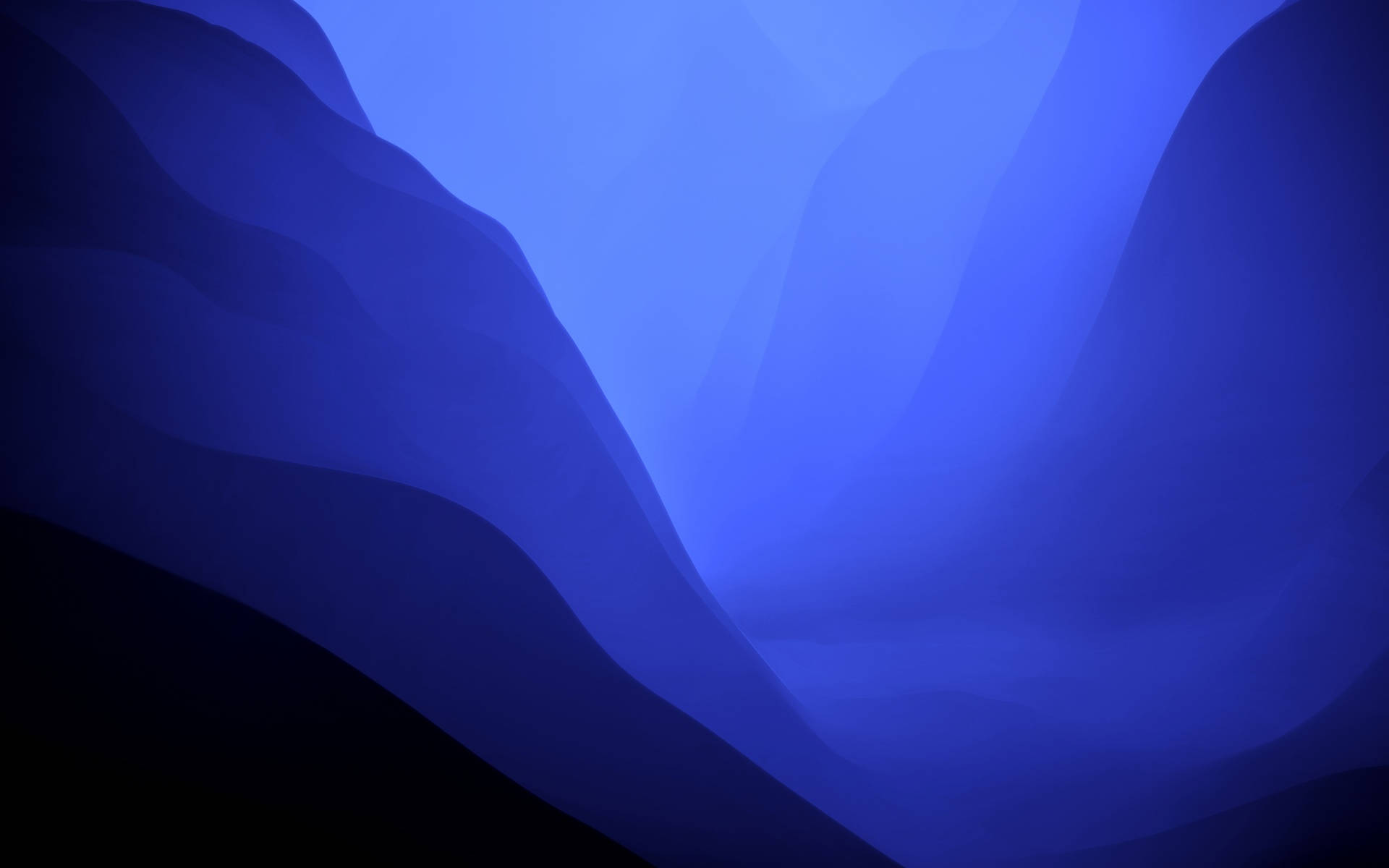 어두운 파란색 배경의 Mac OS Monterey 그라데이션 배경화면