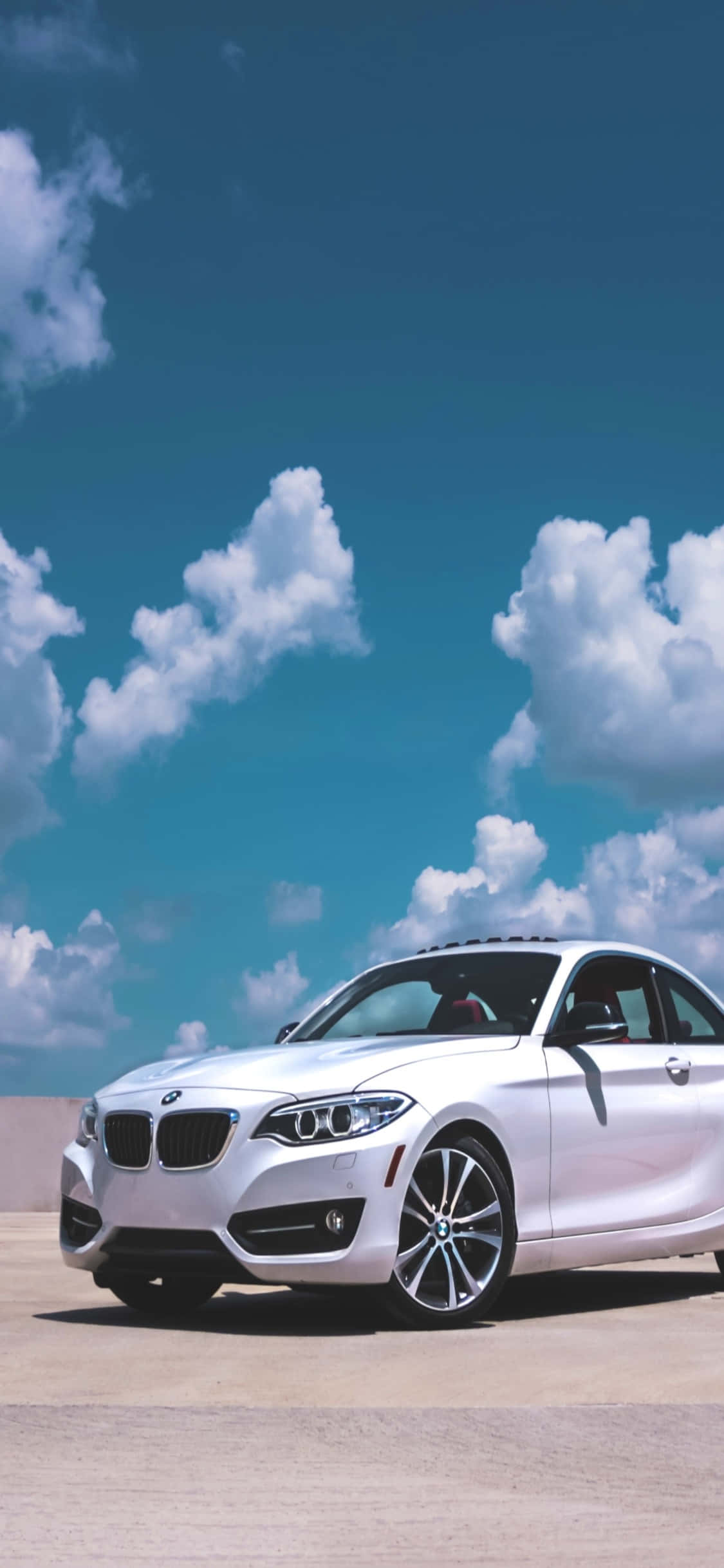 혁신적인 디자인과 기술의 만남: 아이폰 X와 BMW 배경화면