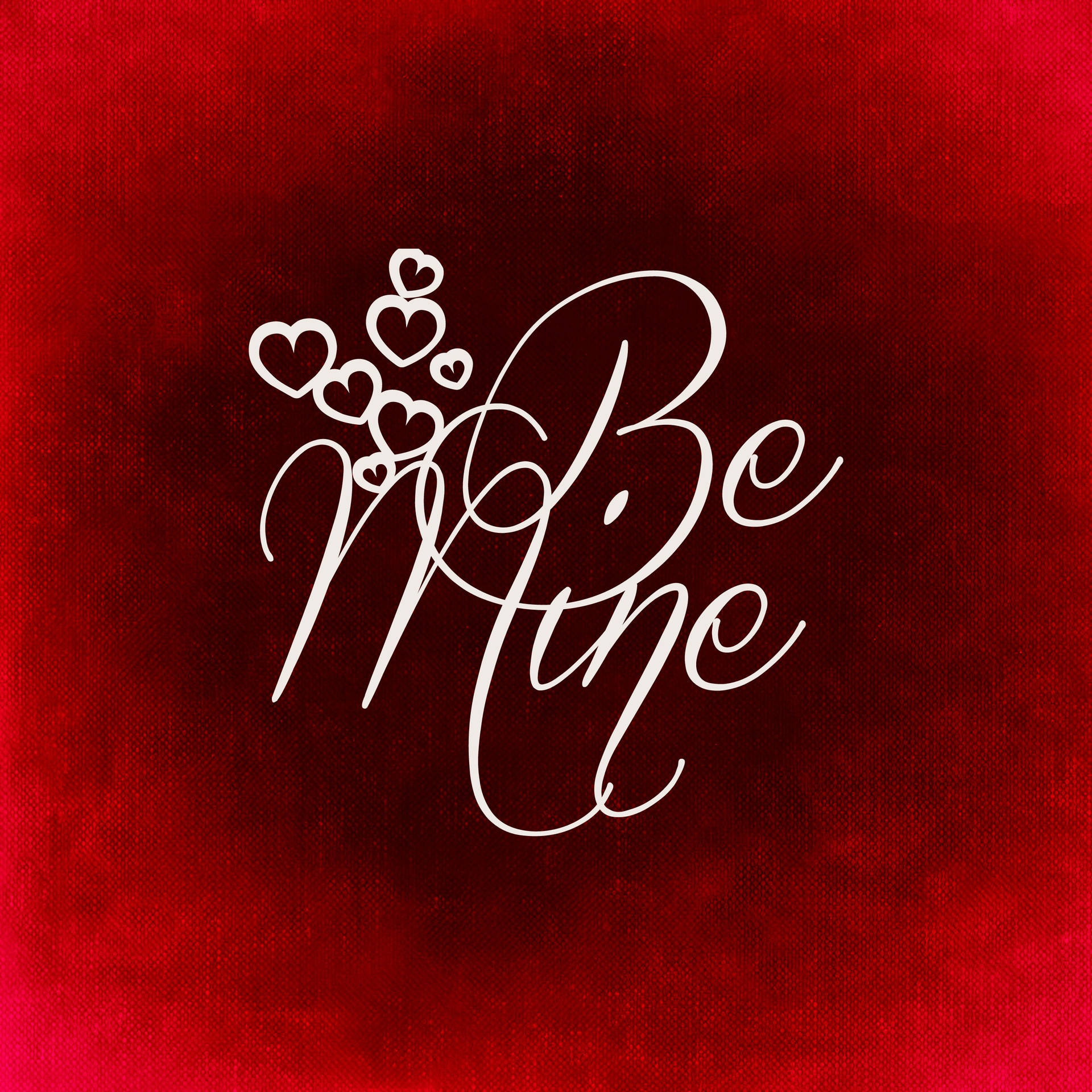 발렌타인데이를 위해 빨간 배경에 하트와 함께 흰색으로 쓰인 'Be mine' 프로포즈 문구