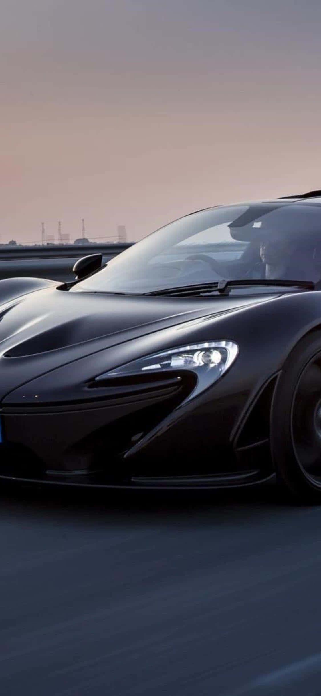 럭셔리한 iPhone XS McLaren 720s의 운전석에 앉아보세요 배경화면