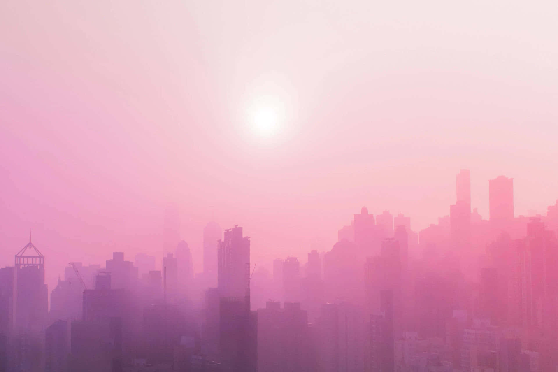부드러운 핑크빛 도시 하늘 배경화면