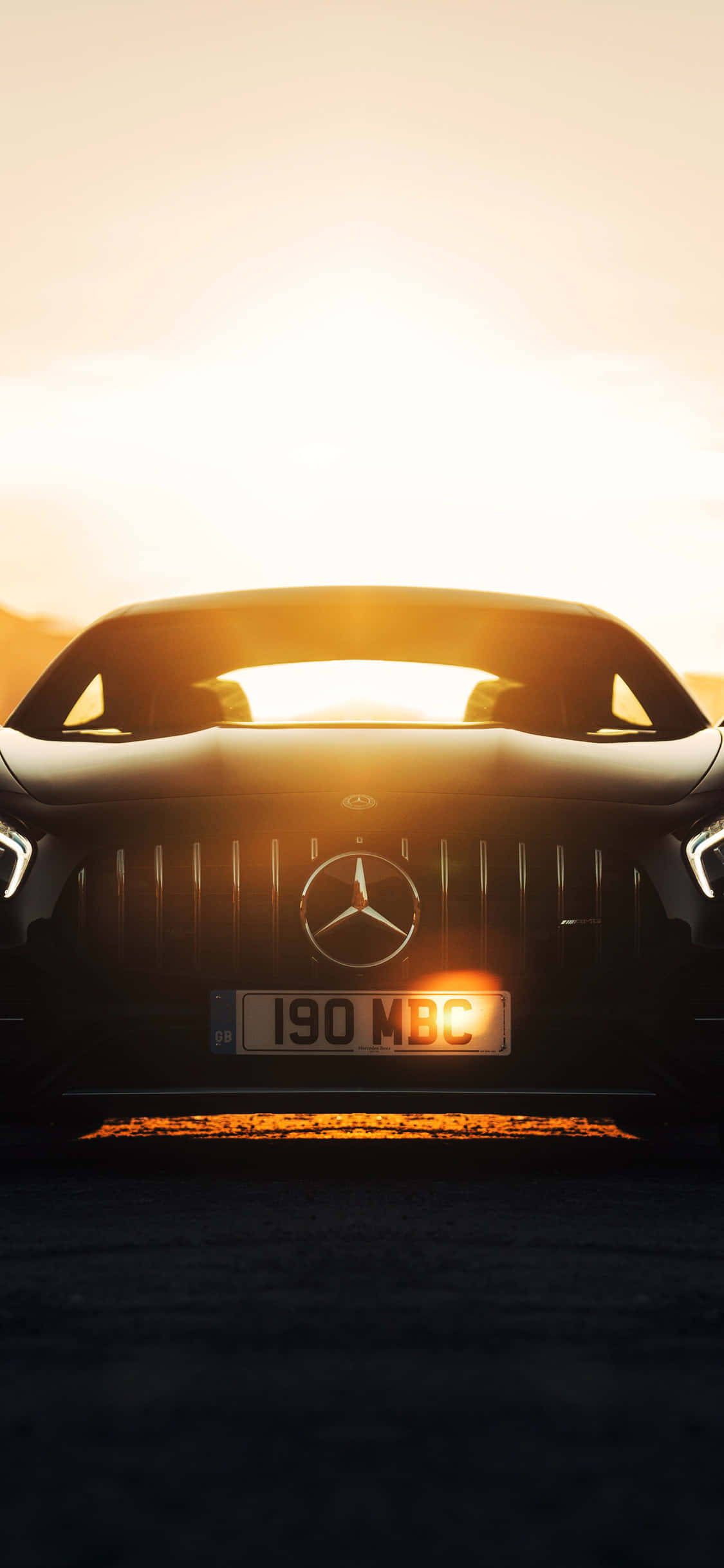 햇빛 속의 아이폰 X AMG GT-R 배경화면
