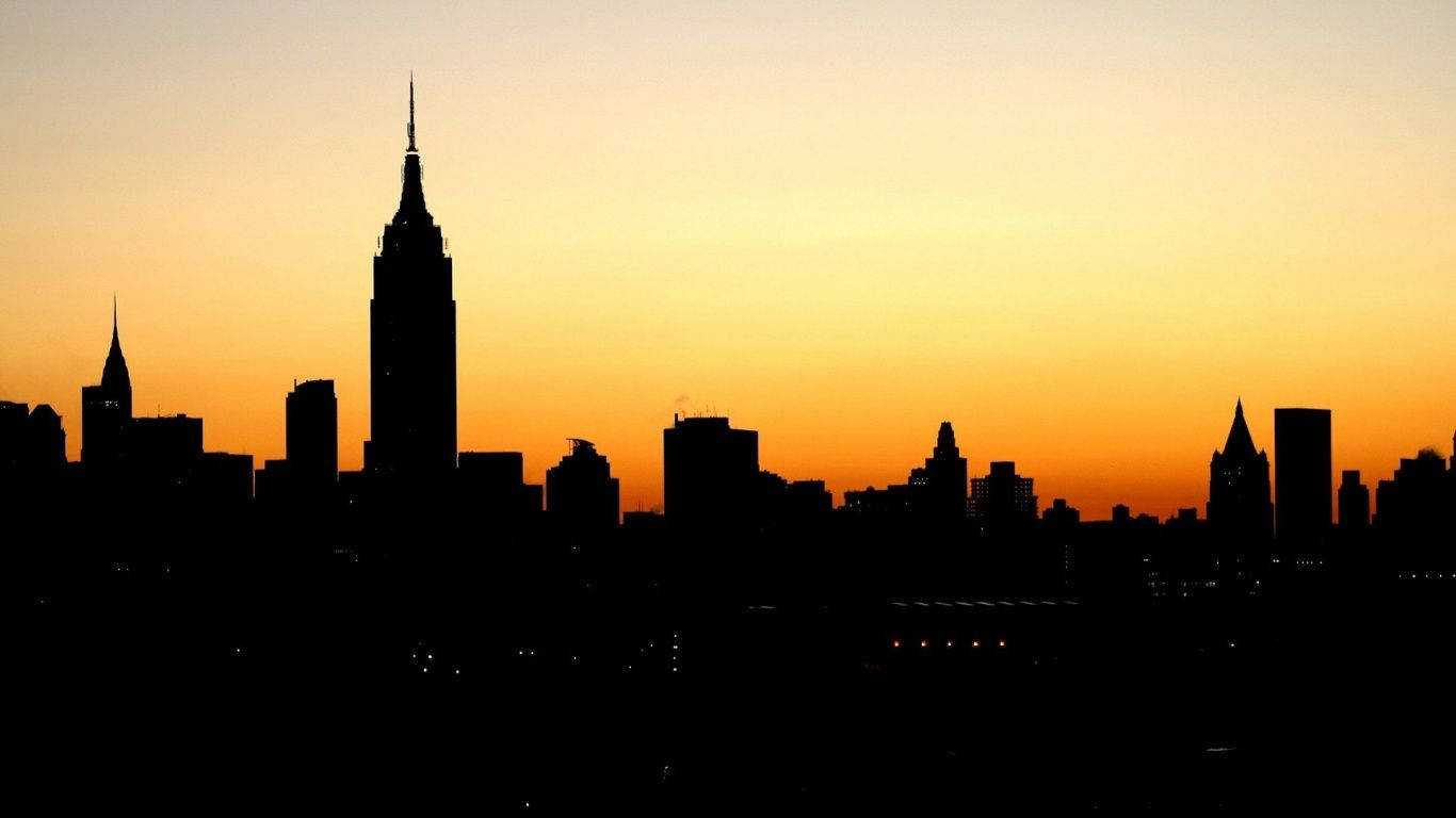 황혼의 아름다운 오렌지 도시 실루엣 배경화면