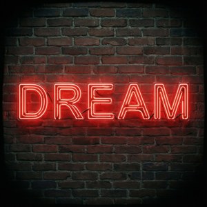 벽돌 벽에 걸린 영감을 주는 네온 레드 DREAM 사인. — 네온 레드 배경화면