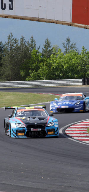 파란색 BMW M6 GT3 레이스카 아이폰 — 갤럭시 S24+ 배경화면