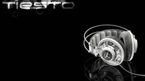 헤드폰을 착용한 쿨한 Tiesto 그래픽 배경화면 — 배터리 절약 배경화면